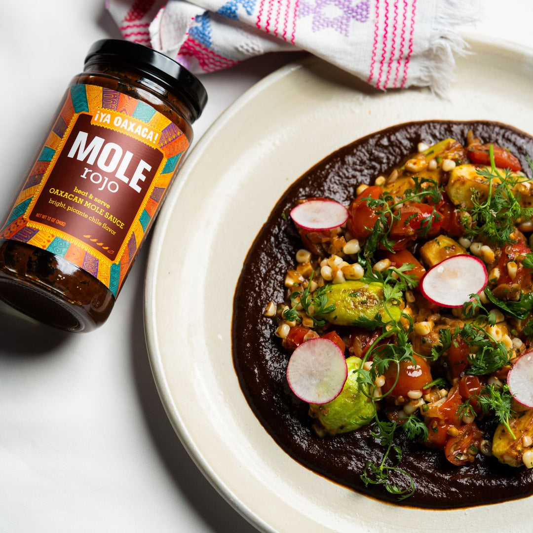 ¡Ya Oaxaca! Mole rojo over grilled summer vegetables.