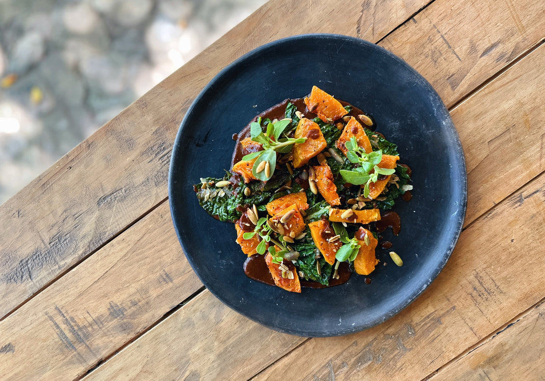 ROASTED BUTTERNUT SQUASH WITH MOLE COLORADITO, KALE AND PEPITAS