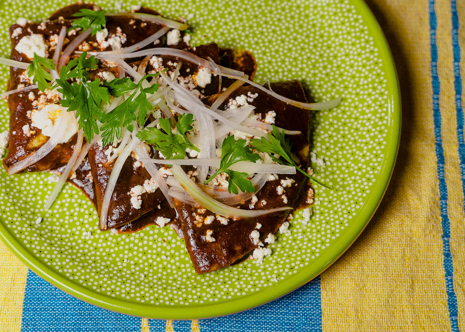 OAXACAN ENCHILADAS IN MOLE COLORADITO OR MOLE ROJO